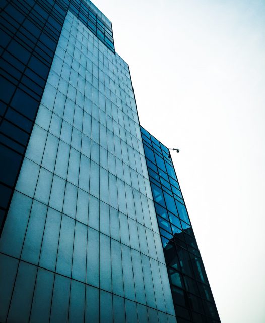 low-angle-photo-of-curtain-glass-wall-building-2408213